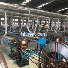 induction heating steel strip online by air cooled induction heater